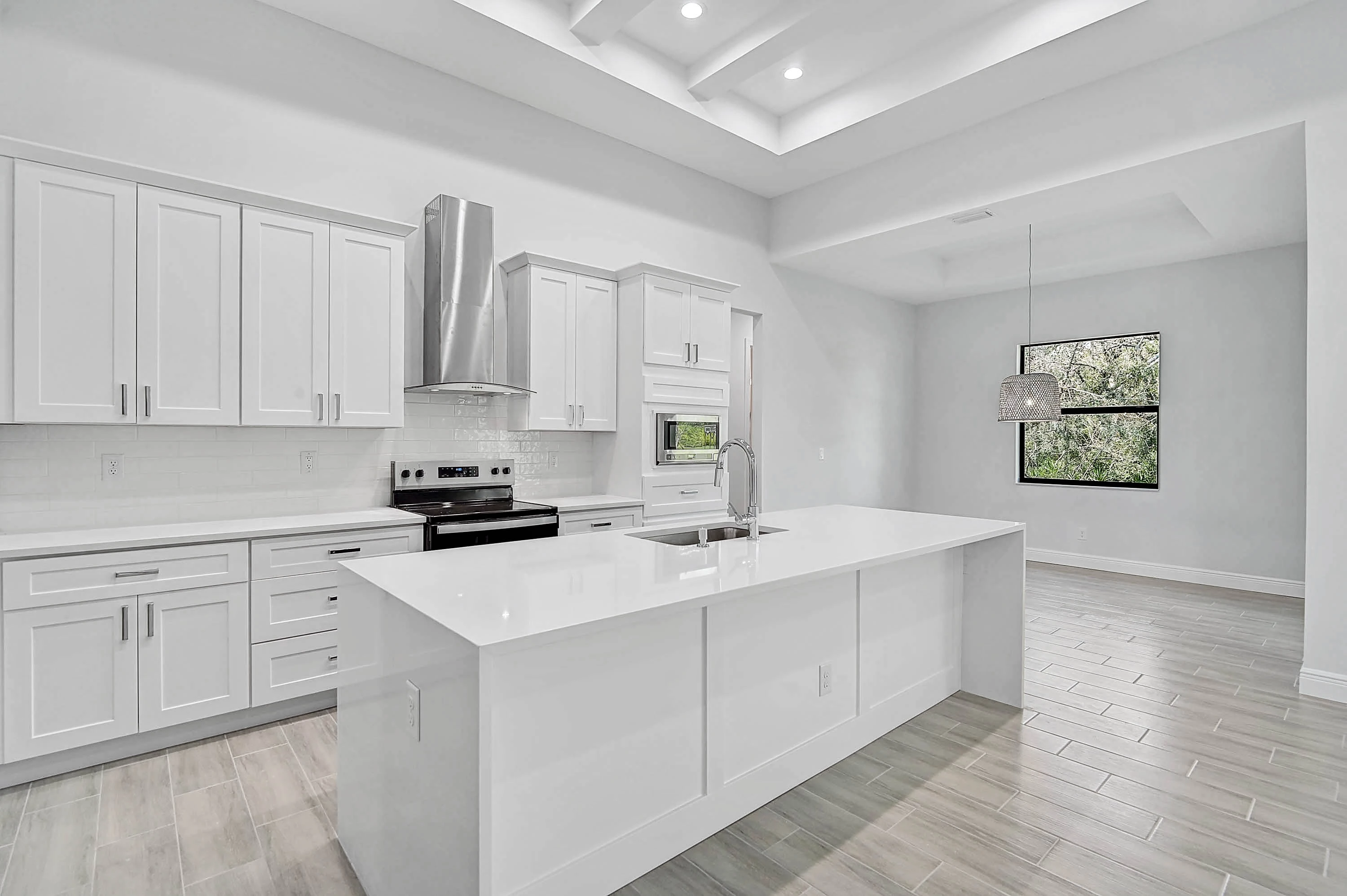 Interior design studio in St. Petersburg, Florida, large work table, display racks with sample tile materials